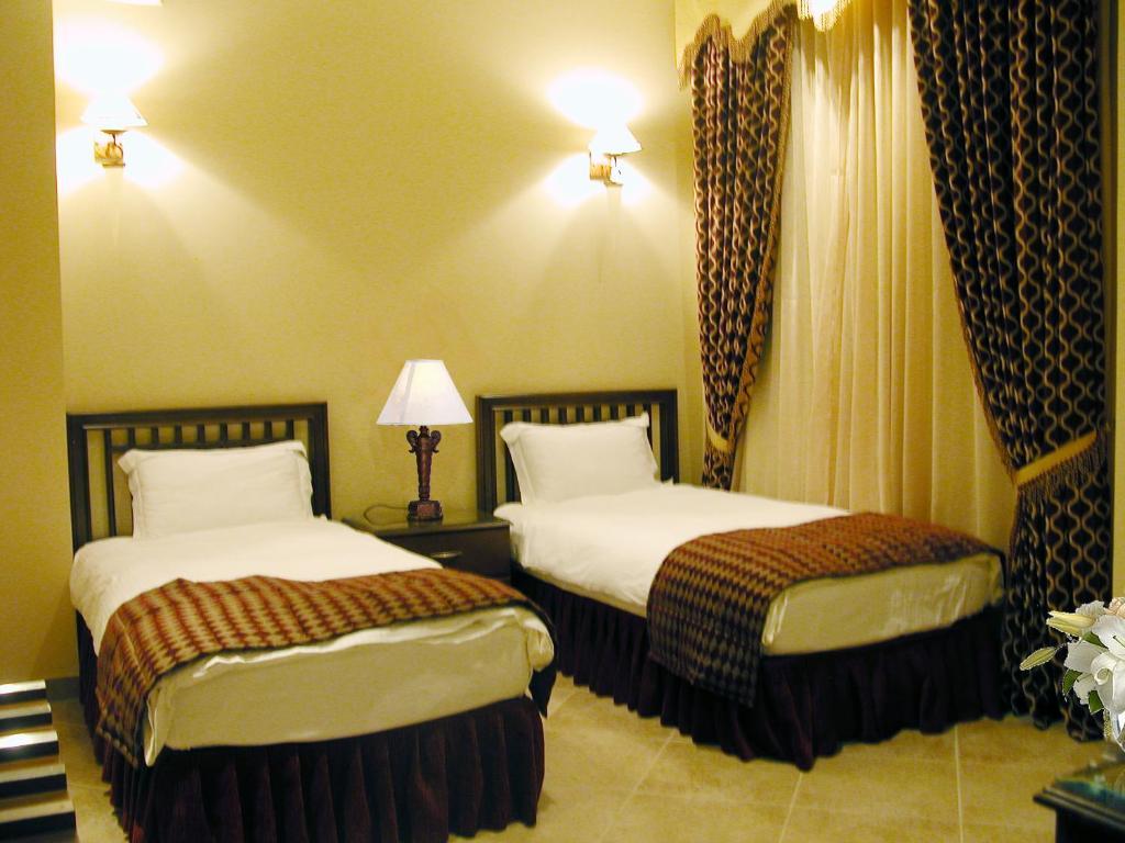 אל חובר Milan Deluxe Suites חדר תמונה